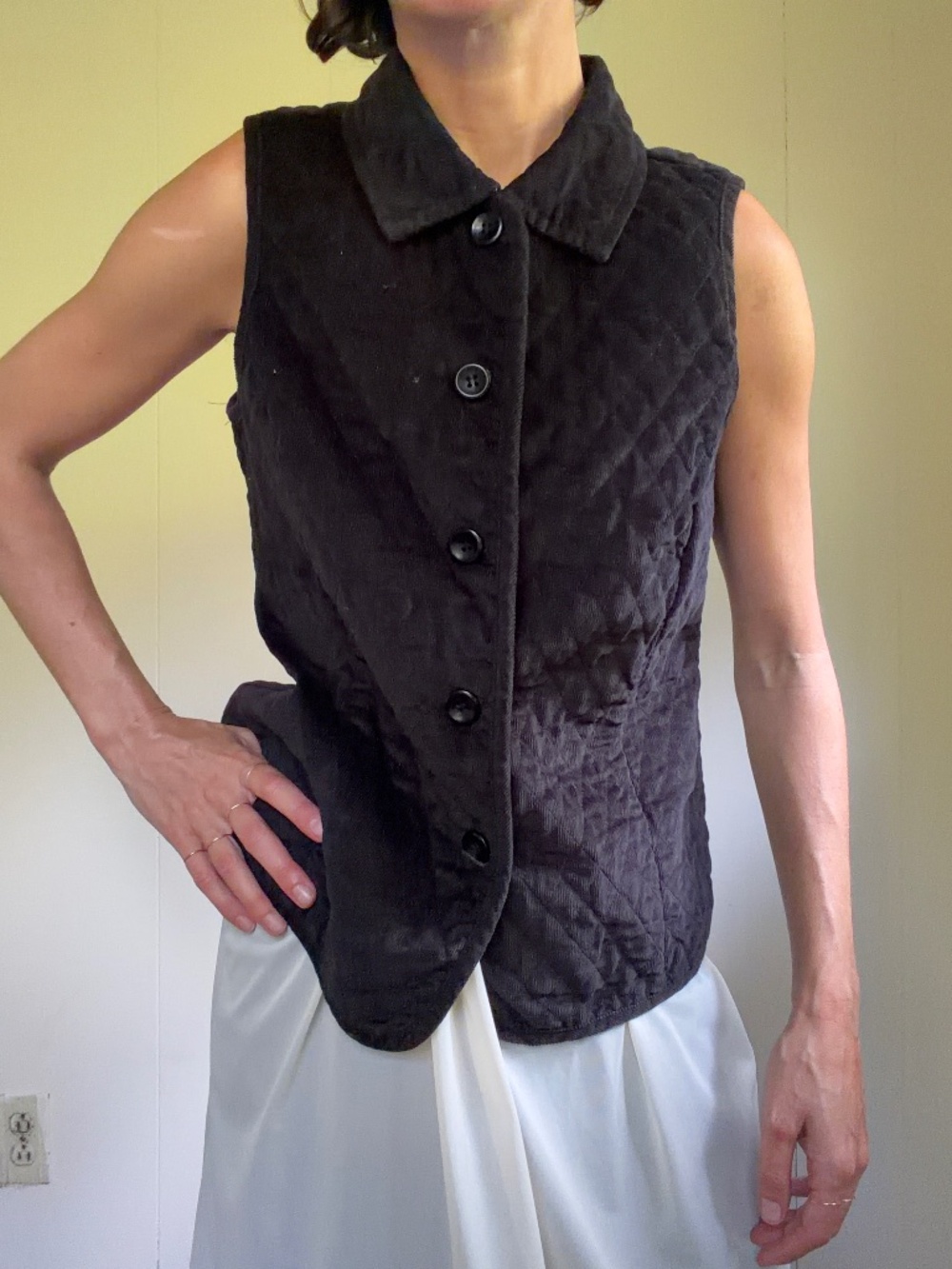 black quilted corduroy vest minimalist old money quiet luxury outdoor gilet